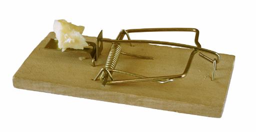 Empty spring loaded mousetrap set ready with a small portion of cheese as bait to catch vermin isolated on white
