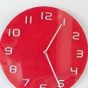 Modern simple circular red clock with Arabic numerals mounted on a white wall with copyspace
