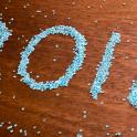 2018 New Year date in blue sequins on wood for a festive celebration of the holiday season in an angle view with copy space