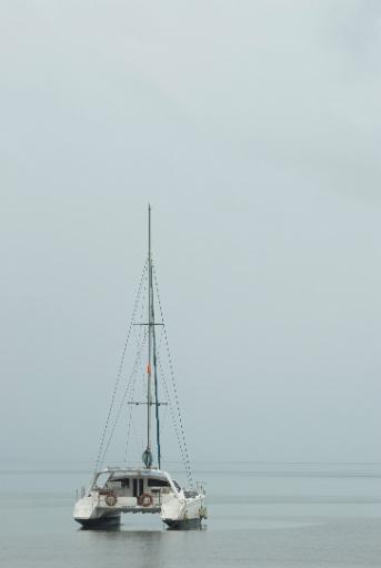 crusing catamaran in calm waters